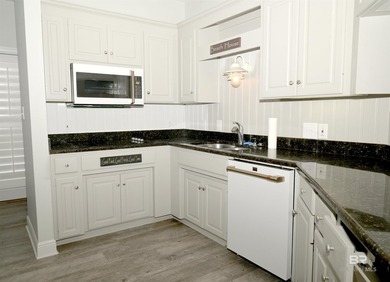 Experience coastal luxury on gated Ono Island. This stunning 3 - photo 8