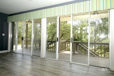 Experience coastal luxury on gated Ono Island. This stunning 3 - photo 10