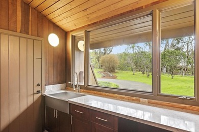 This 10 acre Piiholo property at 4,000' elevation borders a - photo 13