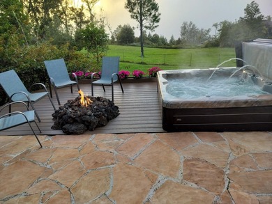 This 10 acre Piiholo property at 4,000' elevation borders a - photo 15