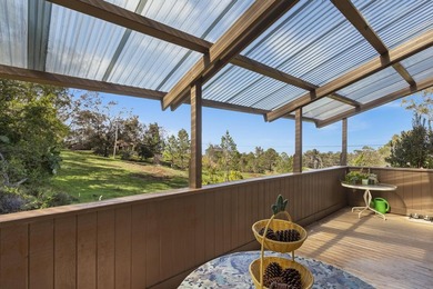 This 10 acre Piiholo property at 4,000' elevation borders a - photo 24