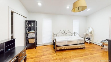 Motivated Seller! Spacious Expanded Cape in North Merrick - Room - photo 9
