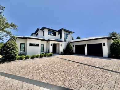 This fabulous GOLD FORTIFIED home is located on Old River with - photo 1