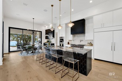 This fabulous GOLD FORTIFIED home is located on Old River with - photo 9