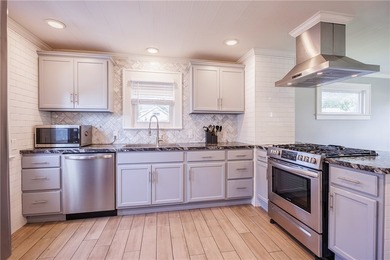Move right into this beautifully renovated home where modern - photo 6