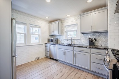 Move right into this beautifully renovated home where modern - photo 8
