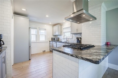 Move right into this beautifully renovated home where modern - photo 9