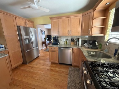 E-X-T-E-N-D-E-D Ranch in move in condition. Updated open kitchen - photo 5