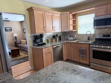 E-X-T-E-N-D-E-D Ranch in move in condition. Updated open kitchen - photo 7