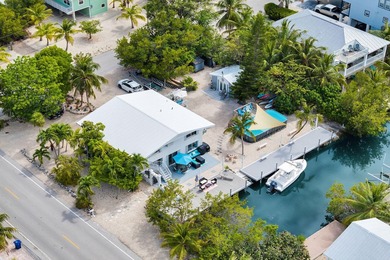 This three bedroom , two bathroom home sits on an expansive 12 - photo 11