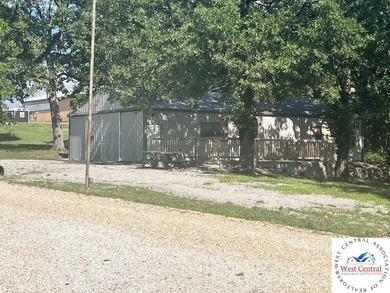 12 acres located perfectly between both Lake of the Ozarks and - photo 11