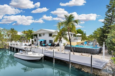 This three bedroom , two bathroom home sits on an expansive 12 - photo 13