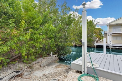This three bedroom , two bathroom home sits on an expansive 12 - photo 18