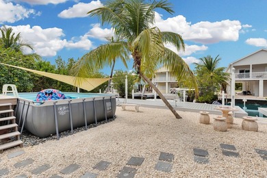 This three bedroom , two bathroom home sits on an expansive 12 - photo 22