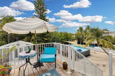 This three bedroom , two bathroom home sits on an expansive 12 - photo 23