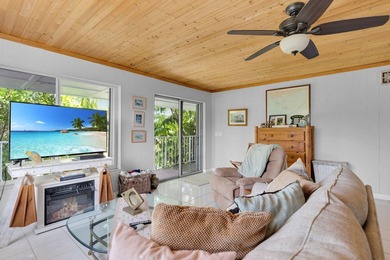 This three bedroom , two bathroom home sits on an expansive 12 - photo 27