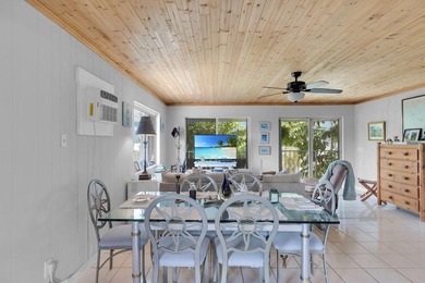 This three bedroom , two bathroom home sits on an expansive 12 - photo 30