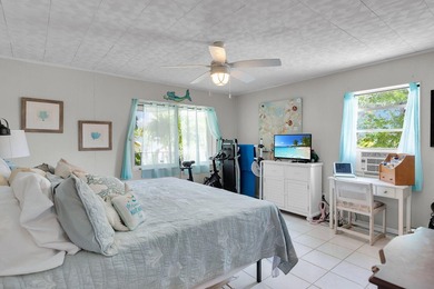 This three bedroom , two bathroom home sits on an expansive 12 - photo 31