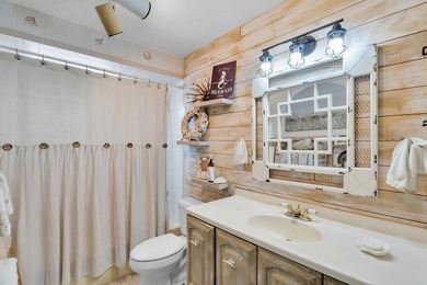This three bedroom , two bathroom home sits on an expansive 12 - photo 34