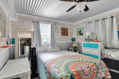 This three bedroom , two bathroom home sits on an expansive 12 - photo 39