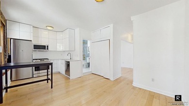 Welcome to this sun-filled, recently renovated two-bedroom home - photo 3