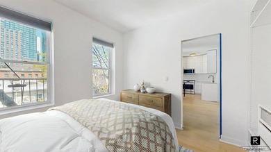 Welcome to this sun-filled, recently renovated two-bedroom home - photo 8