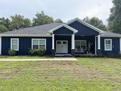 Beautiful home, a must see with no HOA! A place to park an RV or - photo 1