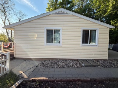 This three-bedroom, two-bathroom home sits across the bay from - photo 11