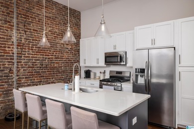 Perfectly positioned in the heart of downtown, this exceptional