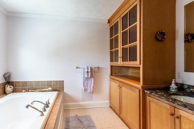 Welcome to this extraordinary circa-1911 estate nestled at the - photo 12