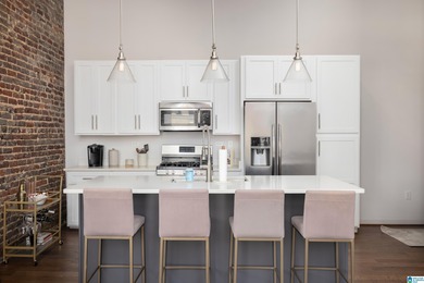 Perfectly positioned in the heart of downtown, this exceptional