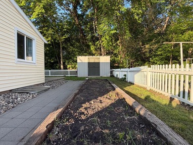 This three-bedroom, two-bathroom home sits across the bay from - photo 13