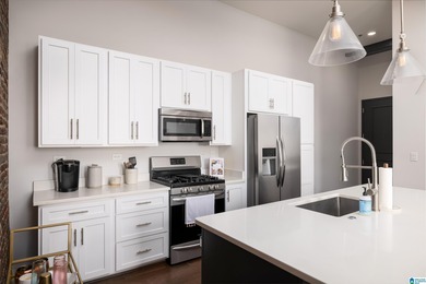 Perfectly positioned in the heart of downtown, this exceptional