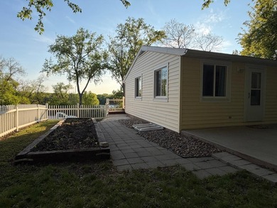 This three-bedroom, two-bathroom home sits across the bay from - photo 15