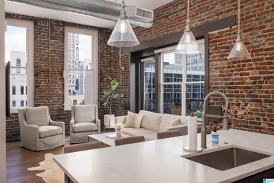 Perfectly positioned in the heart of downtown, this exceptional