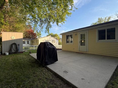 This three-bedroom, two-bathroom home sits across the bay from - photo 18
