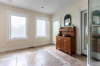 Welcome to this extraordinary circa-1911 estate nestled at the - photo 18