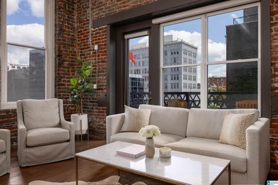 Perfectly positioned in the heart of downtown, this exceptional