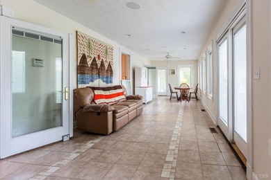 Welcome to this extraordinary circa-1911 estate nestled at the - photo 19