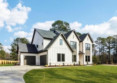 Lake Home For Sale in Cumming, Georgia