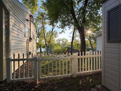 This three-bedroom, two-bathroom home sits across the bay from - photo 23