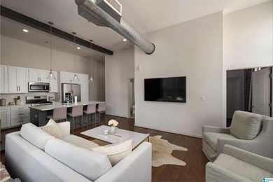 Perfectly positioned in the heart of downtown, this exceptional