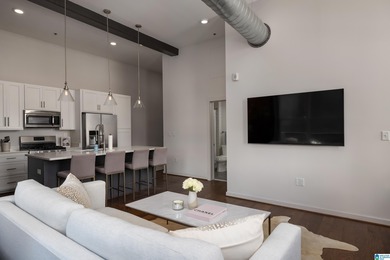 Perfectly positioned in the heart of downtown, this exceptional