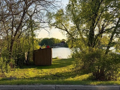 This three-bedroom, two-bathroom home sits across the bay from - photo 27