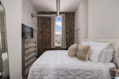 Perfectly positioned in the heart of downtown, this exceptional