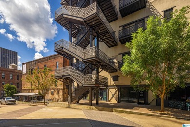 Perfectly positioned in the heart of downtown, this exceptional