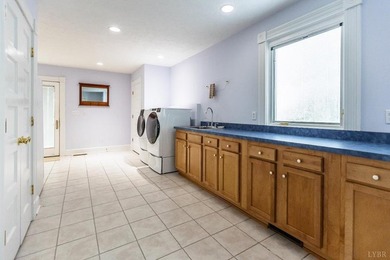 Welcome to this extraordinary circa-1911 estate nestled at the - photo 32