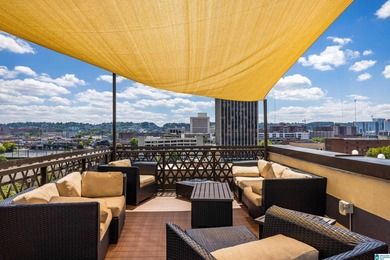 Perfectly positioned in the heart of downtown, this exceptional