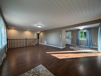 This three-bedroom, two-bathroom home sits across the bay from - photo 37