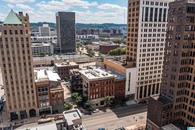 Perfectly positioned in the heart of downtown, this exceptional